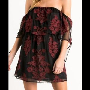 Off Shoulder Dress with Mesh-like overlay. Black with Burgandy Floral Design.